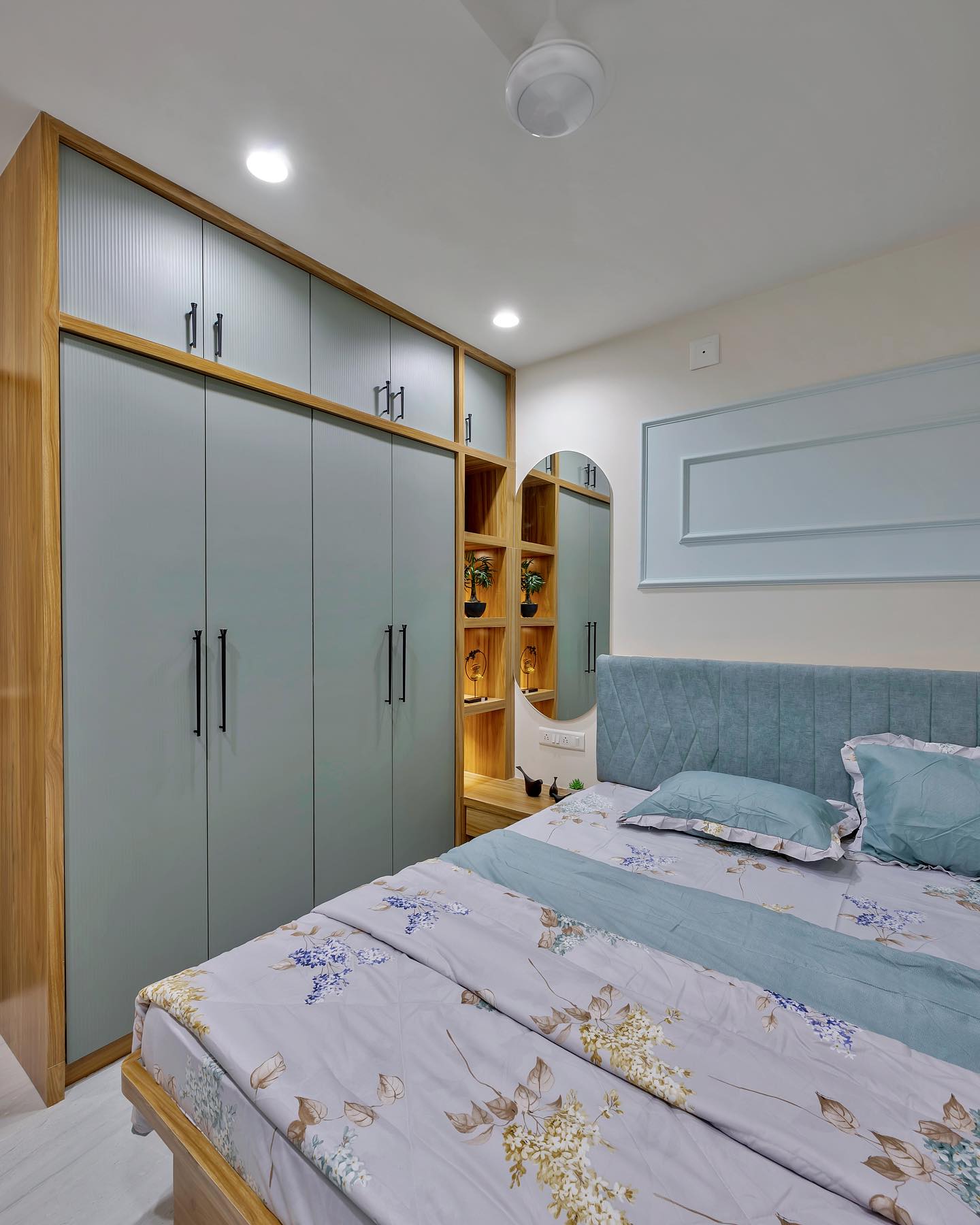 Bedroom with mint wardrobe