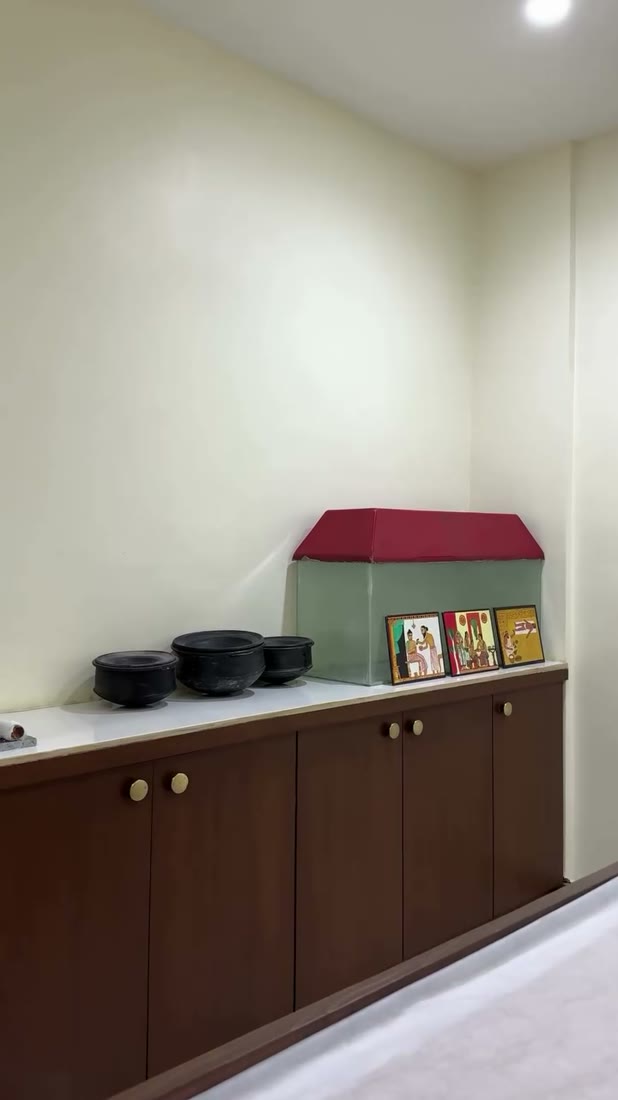 Ayurveda clinic consultation room with cabinetry